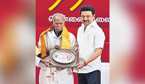 Chief Minister Stalin presents CPI leader R Nallakannu with a memento during an event celebrating his centenary in Chennai.