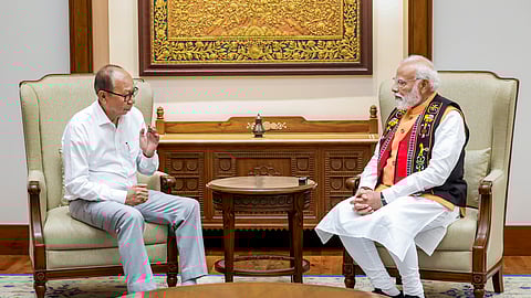 Prime Minister Narendra Modi with Manipur CM Khemchand Yumnam during a meeting.