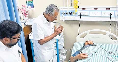 Chief Minister Pinarayi Vijayan visiting Veena George at the Kannur District Hospital.
