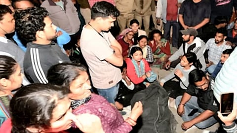 Villagers stage protest at forest department office in Paniyali with the remains of Kamla, who was killed in a tiger attack.