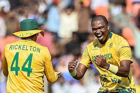 Lungi Ngidi (R) rejoices after taking a wicket on Thursday