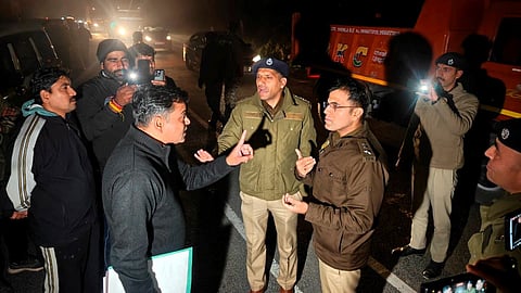 Police officials from Delhi and Shimla in a conversation, in Shimla, Wednesday, Feb. 25, 2026.