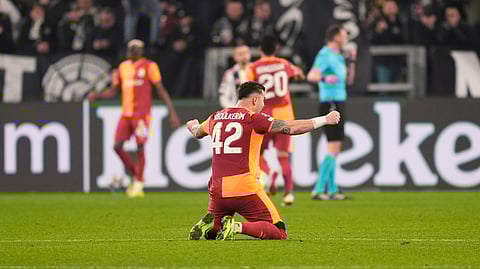 Galatasaray's Abdulkerim Bardakci (42) celebrates after teammate Victor Osimhen scores during extra time in the Champions League soccer match between Juventus and Galatasaray, Wednesday, Feb. 25, 2026, in Turin, Italy