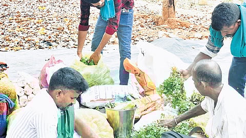 Farmers cook at the protest site near the DC’s office in Mysuru on Thursday. They have been protesting against the reopening of safari at Nagarahole Tiger Reserve and Bandipur, and illegal resorts in Kabini