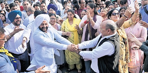 AAP workers danced to the dhol beats and senior leaders shouted ‘Arvind Kejriwal Zindabad