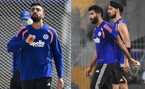 (From L) India bowlers Varun Chakravarthy, Jasprit Bumrah and Arshdeep Singh