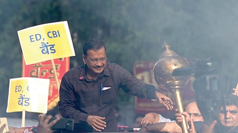 AAP national convener Arvind Kejriwal during a roadshow after he and party leader Manish Sisodia were discharged by a Delhi court in a liquor policy case.