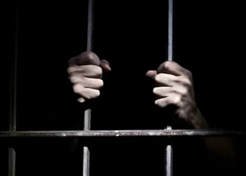 Police reached the spot, rescued the teacher from the angry mob and took him into custody.