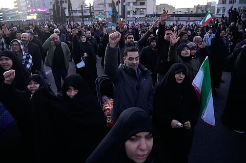 Government supporters chant slogans as they gather in mourning after state TV officially announced the death of Iranian Supreme Leader Ayatollah Ali Khamenei