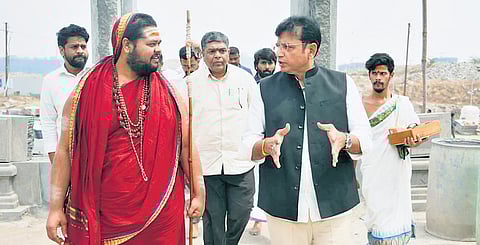 IT & Industries Minister D Sridhar Babu speaks to Uttar Peethadhipathi Swatmanandendra Saraswati Swami during his visit to Sri Sharada Peetham at Kokapet, Hyderabad on Sunday