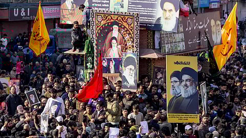 People protest against the alleged killing of Iranian Supreme Leader Ayatollah Ali Khamenei in a reported US-Israel strike, in Srinagar, Sunday, Mar. 1, 2026.