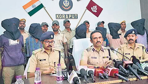 Police with the six arrested accused | Express