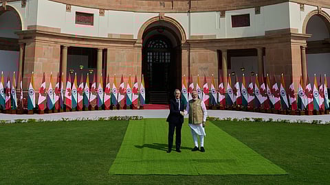 Indian Prime Minister Narendra Modi, right, shakes hands with his Canadian counterpart Mark Carney before their delegation level meeting in New Delhi, India.