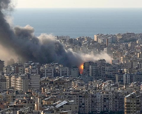 Flames and smoke rising after Israeli airstrikes on Dahiyeh, a southern suburb of Beirut, Lebanon, on Monday.