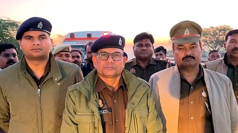 Additional Superintendent of Police Ram Anand Kushwaha, centre, speaks to the media after a double-decker bus rammed into a van early morning, on Yamuna Expressway in Hathras,