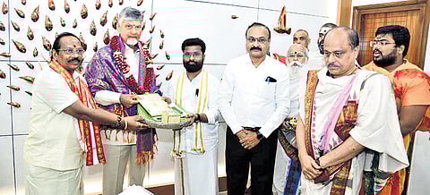 Sri Durga Malleswara Swami Varla Devasthanam Chairman Borra Radha Krishna and EO Seena Naik invite Chief Minister Nara Chandrababu Naidu for the Kumbhabhishekam