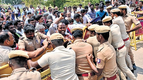 Police stopped residents who tried to block traffic on NH on Tuesday; (below) VCK chief Thirumavalavan speaks to affected people on video call.