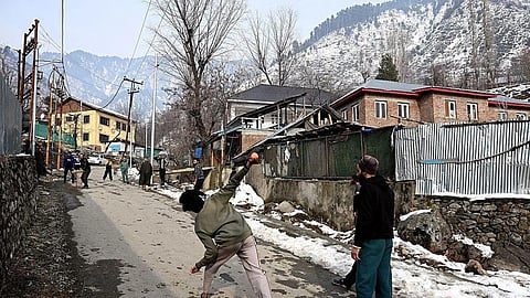 Youth playing gully cricket on the outskirts of Srinagar. J&K won the trophy 44 years after winning its first match and 67 years after it entered the Ranji tournament