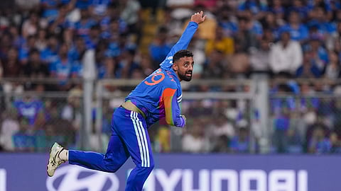 India's Varun Chakravarthy bowls a delivery during the ICC Men's T20 World Cup 2026 second semifinal cricket match between India and England, at the Wankhede Stadium, in Mumbai, Maharashtra, Thursday, March 5, 2026.