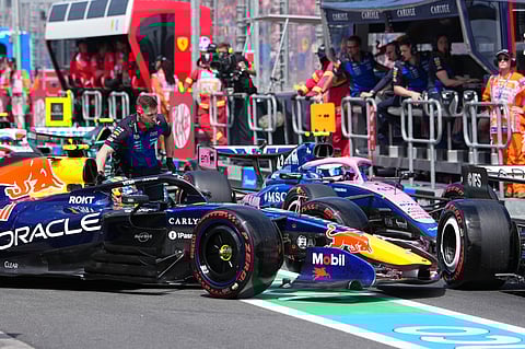 Red Bull driver Isack Hadjar of France steers his car into pit lane during the third practice session for the Australian Formula One Grand Prix.