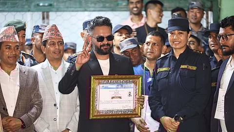 Balendra Shah, former mayor of Kathmandu Metropolitan City and prime ministerial candidate of the Rastriya Swatantra Party, receives his victory certificate after defeating former Prime Minister Khadga Prasad Oli of the Communist Party of Nepal–Unified Marxist-Leninist (CPN-UML) in Jhapa.