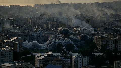 Flames rise from an oil storage facility south of the capital Tehran as strikes hit the city during the U.S.–Israeli military campaign, Iran, Saturday, March 7, 2026.