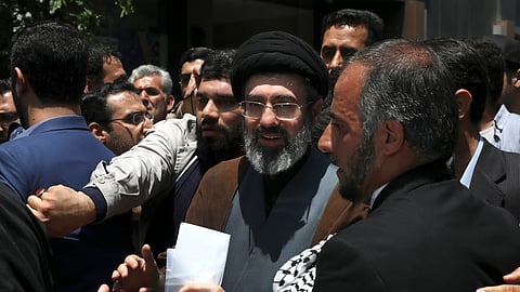 Mojtaba Khamenei, the son of Iranian Supreme Leader Ayatollah Ali Khamenei, center, attends the annual Quds, or Jerusalem Day rally in Tehran, Iran, on May 31, 2019.