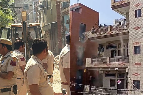 Police officials at the site, after Municipal Corporation of Delhi, carried out a demolition drive and razed illegal portions of a house linked to one of the accused in the Uttam Nagar Holi clash case