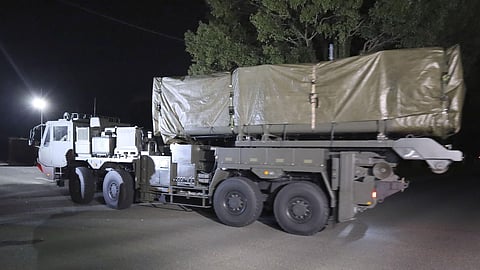 A vehicle carrying the first batch of domestically developed long-range missiles, arrives at Camp Kengun in Kumamoto, southwestern Japan, early Monday, March 9, 2026.