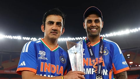 India's head coach Gautam Gambhir (L) with Captain Suryakumar Yadav after India won the T20 World Cup against New Zealand