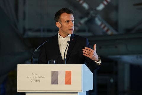French President Emmanuel Macron speaks during a news conference joined by Cyprus President Nikos Christodoulides and Greece's Prime Minister Kyriakos Mitsotakis at Andreas Papandreou Air Base in Paphos, Cyprus, on Monday, March 9, 2026.