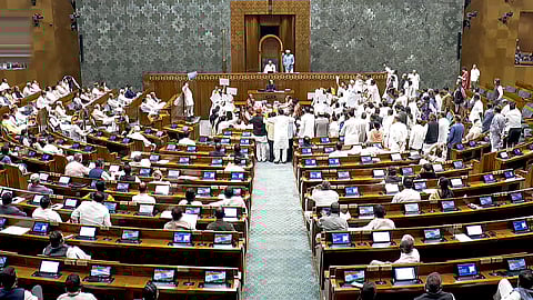 Opposition protest seeking debate in Lok Sabha on West Asia crisis during the second part of Budget session of Parliament, in New Delhi, Monday, March 9, 2026.
