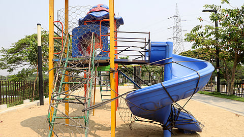 Play equipment installed at the children's park on the shores of Krishnampathy Lake under the Smart City project.