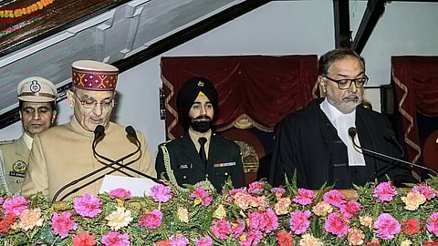 Chief Justice of the Himachal Pradesh High Court, Justice Gurmeet Singh Sandhawalia administers the oath to Governor Designate Himachal Pradesh Kavinder Gupta, at Lok Bhawan in Shimla on Tuesday.