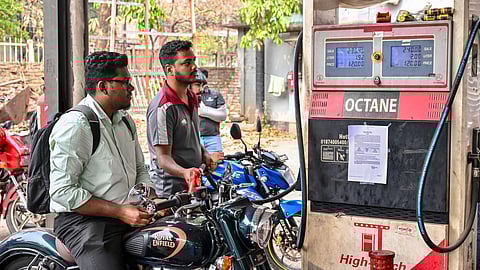 A man gets his motorcycle refueled at a fuel station in Dhaka on March 9, 2026.