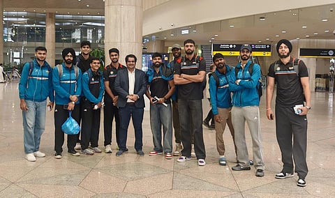 A group of senior India men's basketball team pictured at the airport