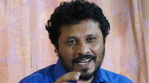 Vincent Kathir addressing the media in Madurai.