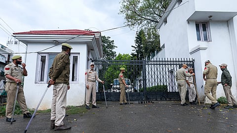 Security personnel deployed outside the residence of National Conference president Farooq Abdullah after a gunman fired a shot targeting him and J&K Dy CM Surinder Choudhary at a wedding function on Wednesday, in Jammu, Thursday, March 12, 2026.