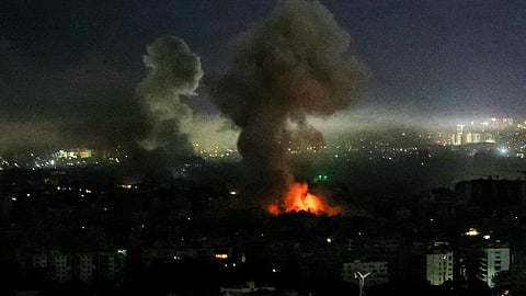Smoke rises from the site of an Israeli airstrike that targeted an area in Beirut’s southern suburbs on March 11, 2026.