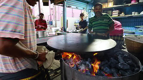 Small eateries still use charcoal as fuel in many parts of Madurai district.
