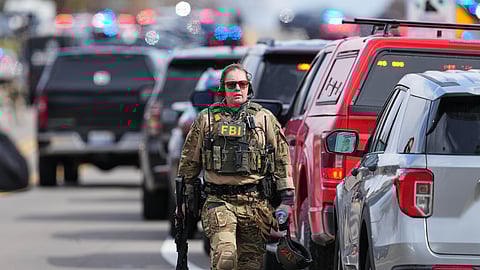Law enforcement respond to a call at Temple Israel synagogue Thursday, March 12, 2026, in West Bloomfield Township, Mich.