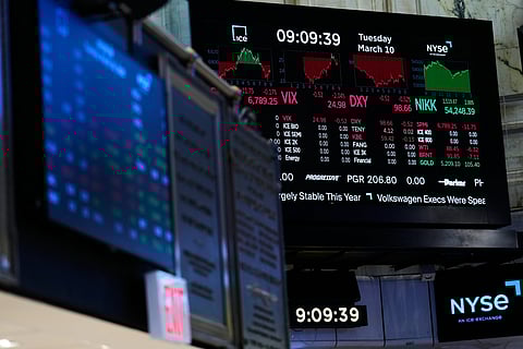 Screens display financial information on the floor at the New York Stock Exchange in New York.