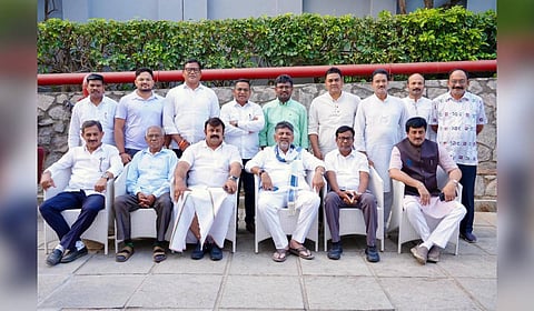 DCM DK Shivakumar poses with the Odisha Congress MLAs in Bengaluru on Friday.
