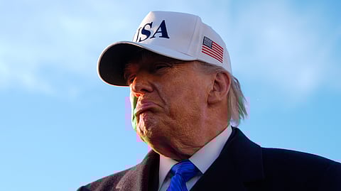President Donald Trump speaks to reporters before he boards Air Force One, Friday, March 13, 2026, at Joint Base Andrews, Md., for a trip to Florida.