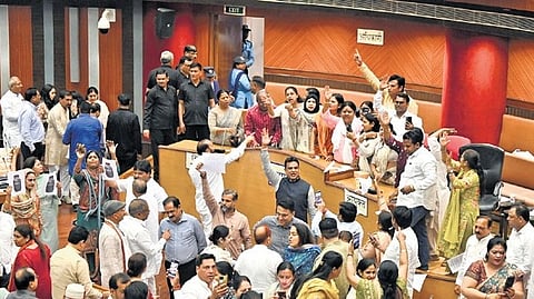 AAP councillors protest during the MCD House meeting at Civic Centre.