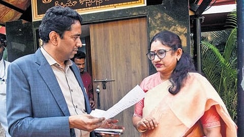 NTR District Collector G Lakshmisha interacting with DEO L Chandrakala regarding conduct of SSC examinations at the Collectorate in Vijayawada.