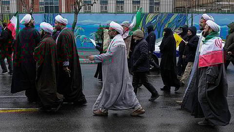 Clerics and other demonstrators attend the annual Quds Day, or Jerusalem Day, rally in support of Palestinians in Tehran, Iran, Friday, March 13, 2026.