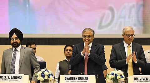 Chief Election Commissioner Gyanesh Kumar along with Election Commisioners S S Sandhu and Vivek Joshi.