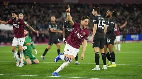 West Ham's Konstantinos Mavropanos celebrates scoring his side's first goal during the English Premier League soccer match between West Ham United and Manchester City in London, England, Saturday, March 14, 2026.