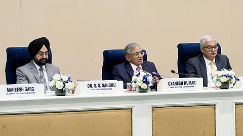Chief Election Commissioner Gyanesh Kumar, centre, with Election Commissioners S S Sandhu, left, and Vivek Joshi during a press conference to announce the Assembly election schedule